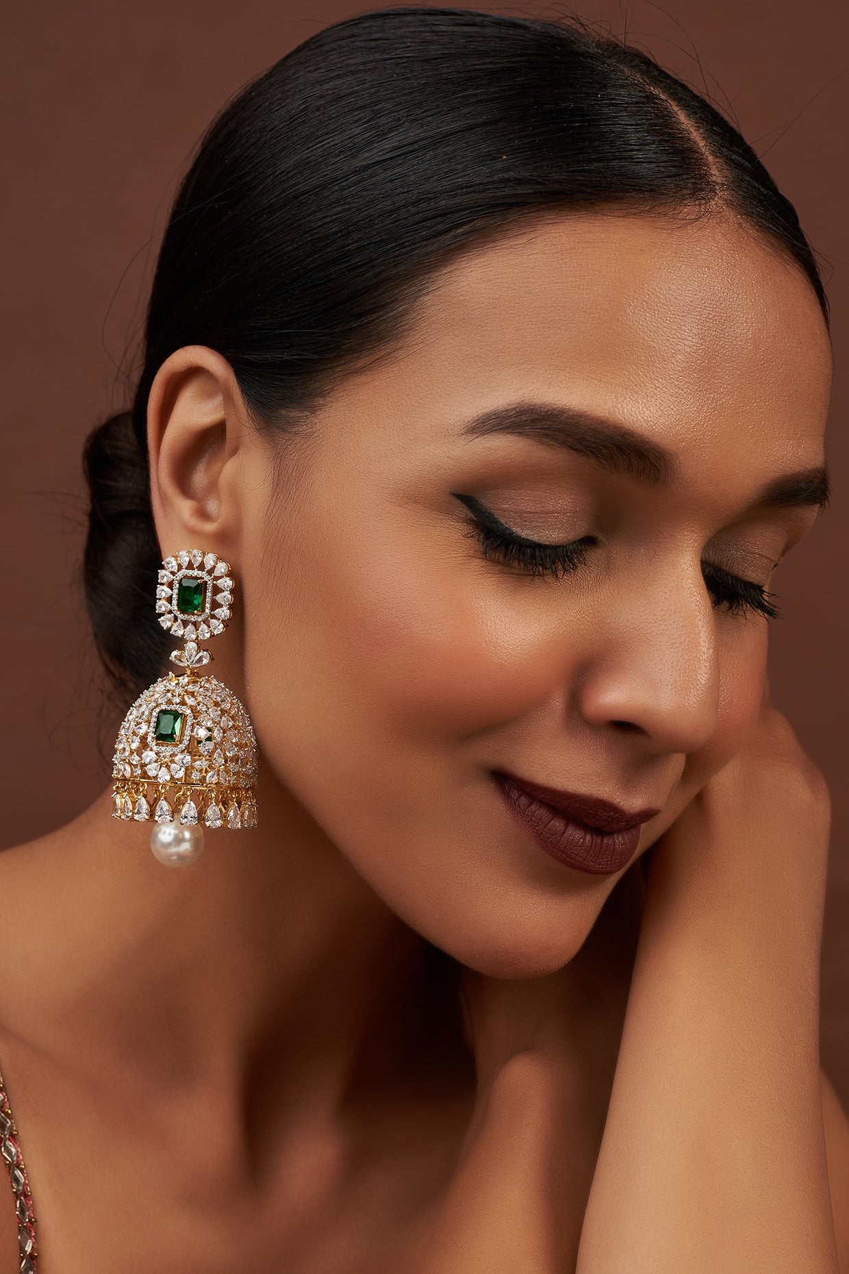 Two Tone Finish Cubic Zirconia & Emerald Jhumka Earrings in Sterling Silver