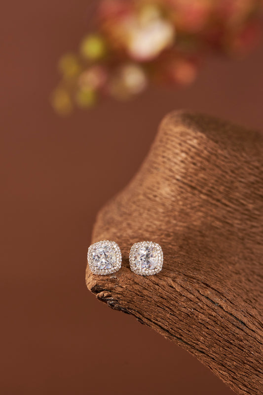 White Finish Eurostar Zirconia Stud Earrings In Sterling Silver