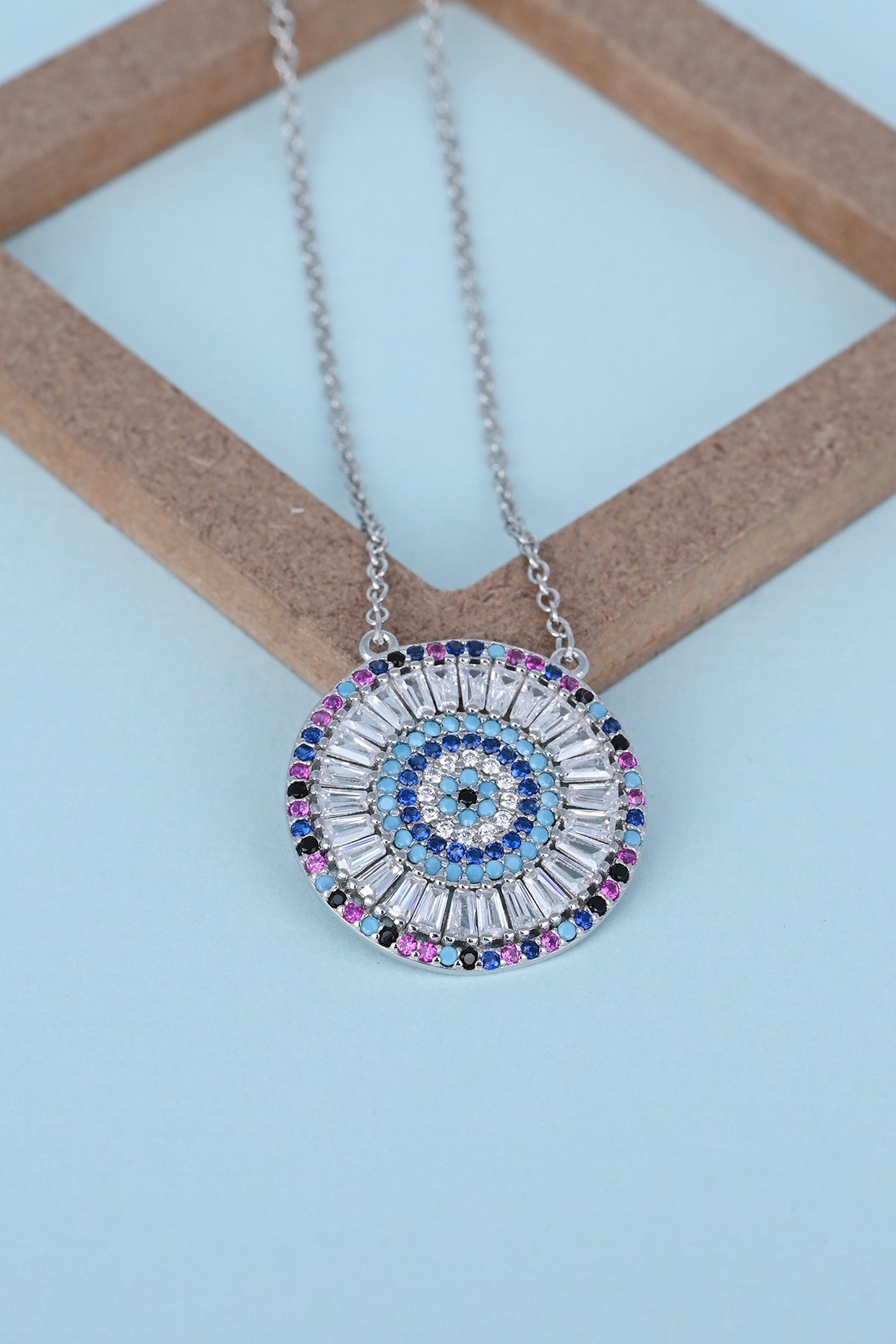 Blue Zircon Round Necklace In Sterling Silver