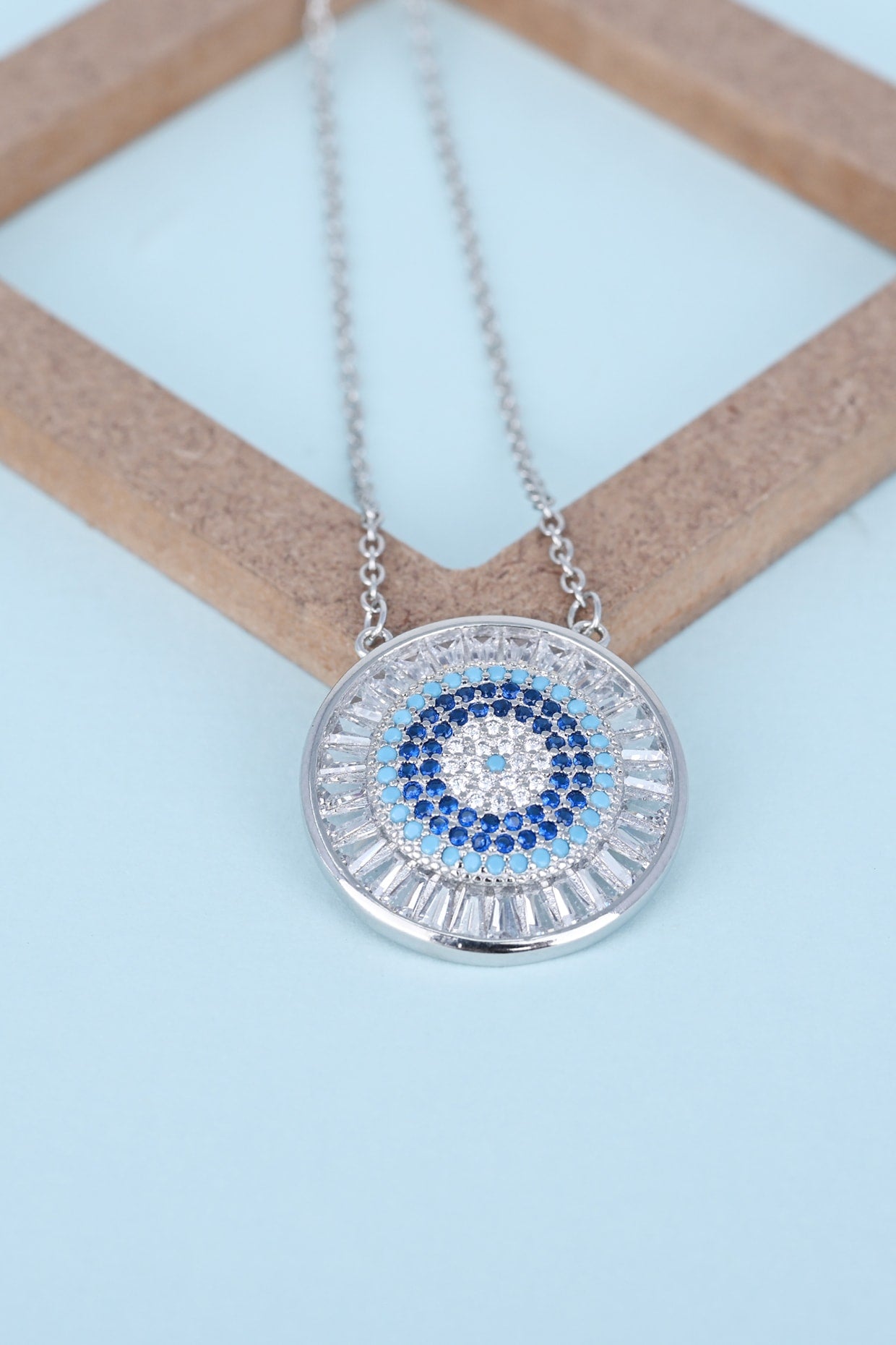 Blue Zircon Circle Necklace In Sterling Silver