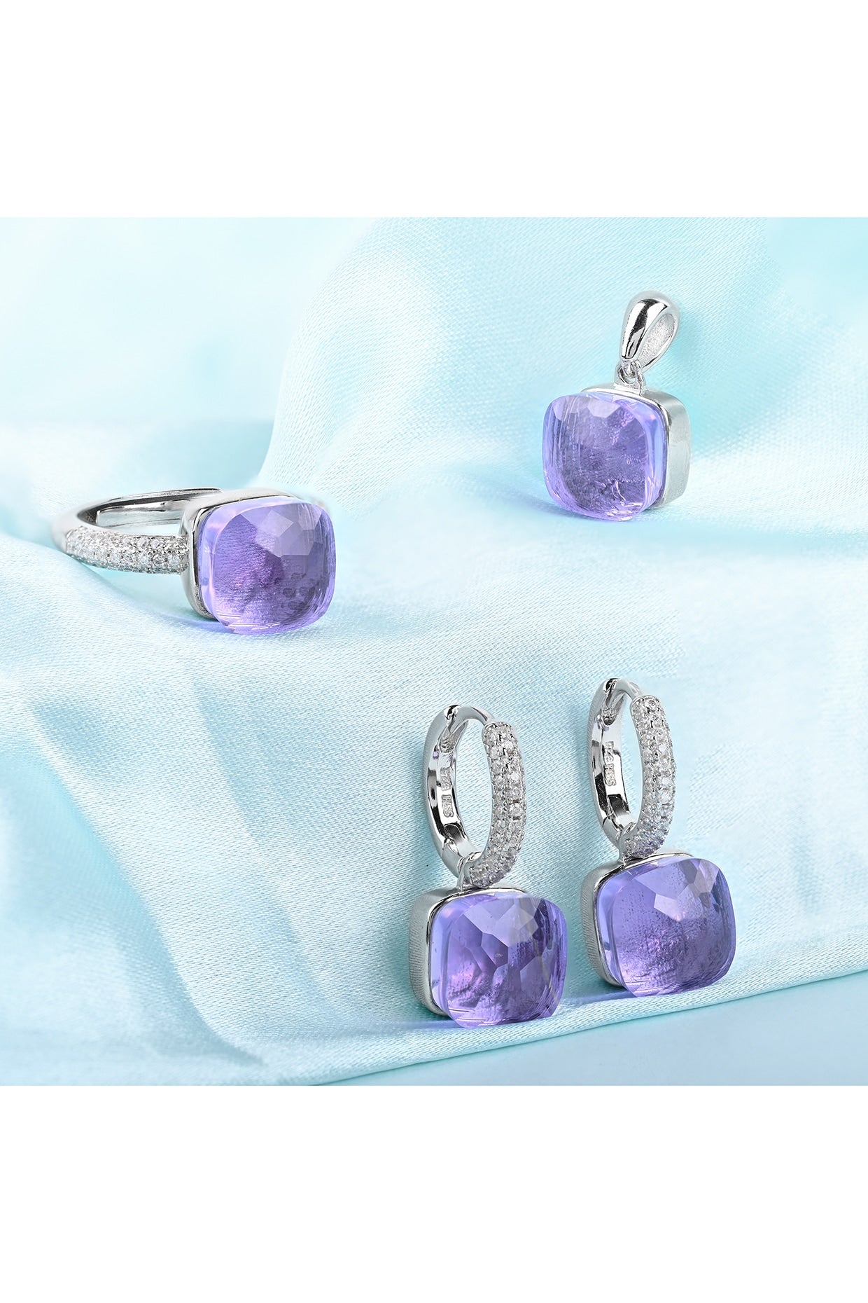 Purple Stone & Zircon Pendant Set In Sterling Silver