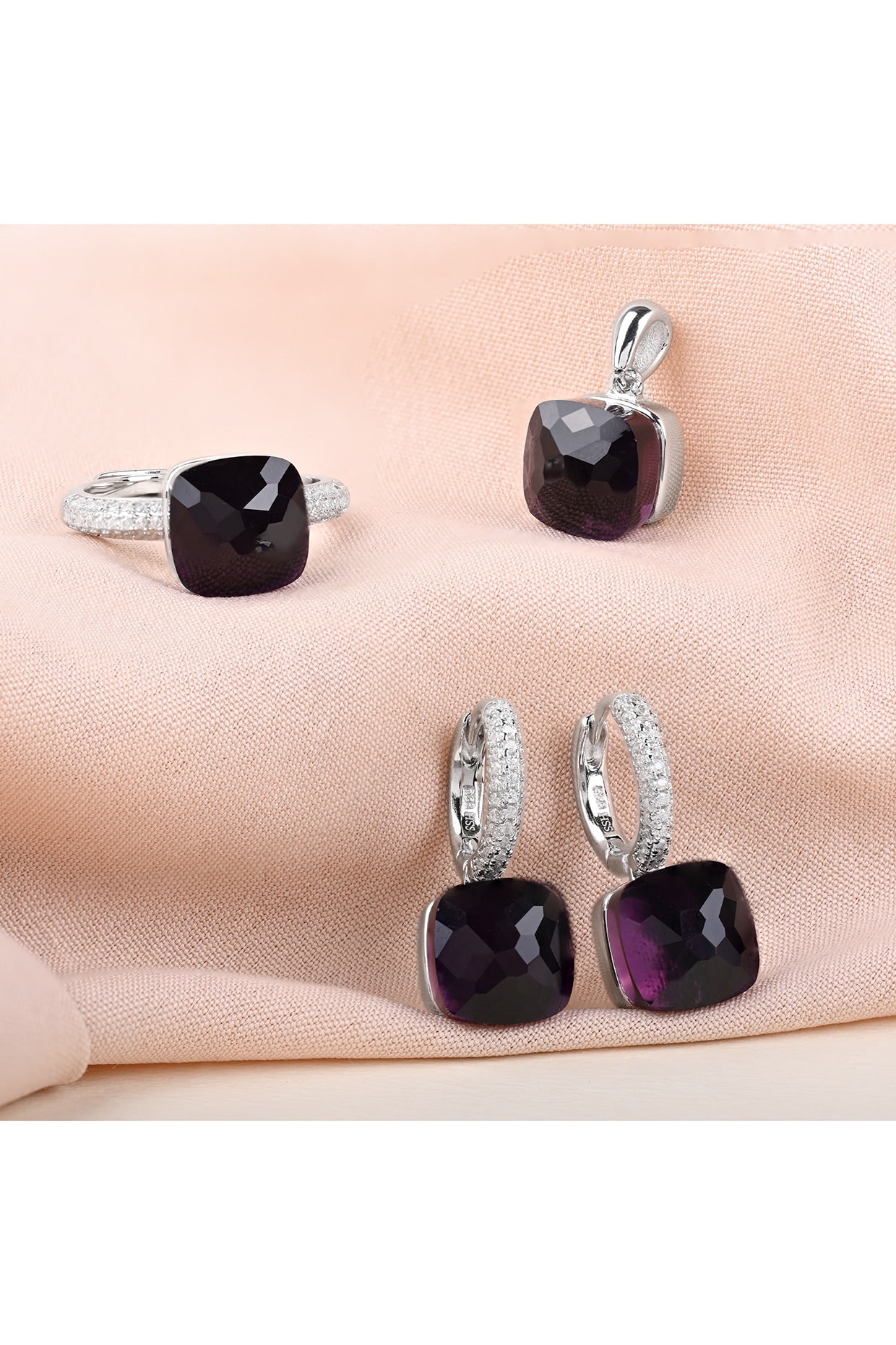 Purple Stone & Zircon Pendant Set In Sterling Silver