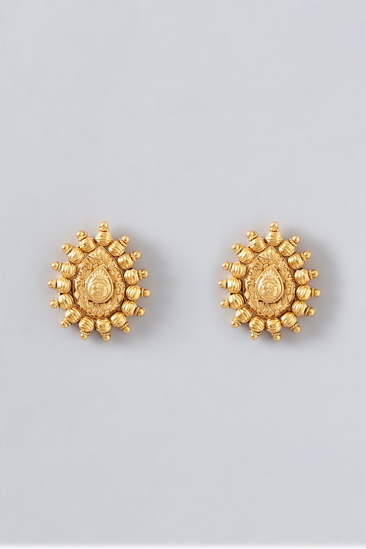 Gold Finish Kundan Polki & Red Stone Temple Stud Earrings