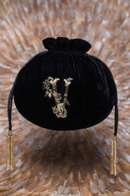 Black Embroidered Calligraphy Potli With Drawstrings