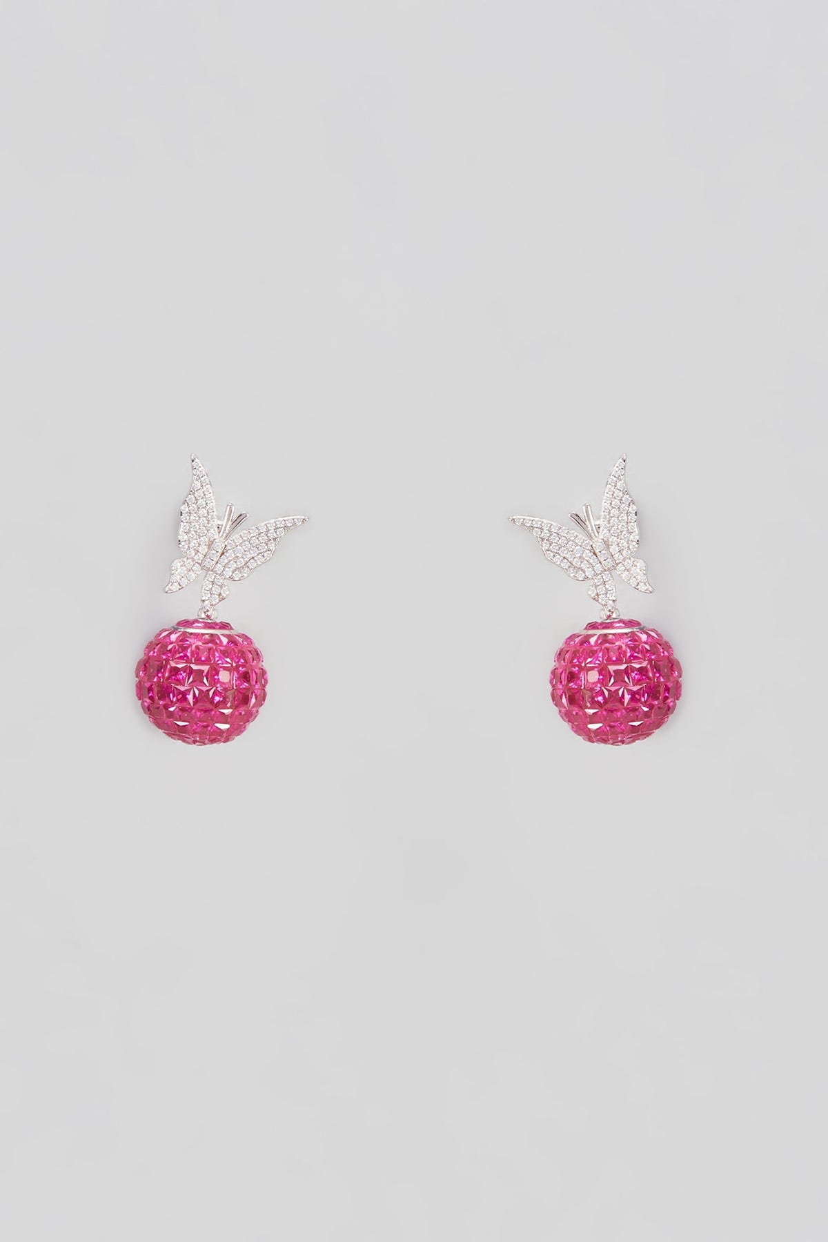 White Plated Cubic Zircons & Ruby Drop Butterfly Dangler Earrings In Sterling Silver