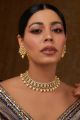 Kesar Pearl Drop Kundan Choker Set